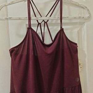 A burgundy color romper